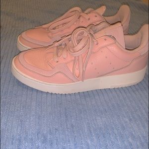 Size women’s US size 8.5 baby pink adidas sneakers
